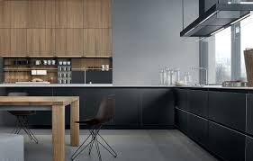 Cocina con pavimento hidráulico en blanco y negro. Madera Y Negro En La Cocina 18 Ideas Para Una Combinacion Ganadora