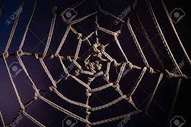 Japanese Traditional Technique Of Knitting Shibari Ropes In The Form Of A Spider  Web. No People. Part Of The Bedroom Interior. BDSM. Stock Photo, Picture  And Royalty Free Image. Image 149637595.