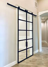 Here, the doors actually overlap and slides over one another so that a part of the opening is easily. Custom Metal And Glass Barn Doors Built For You