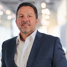 Tim Heck Promoted to Chief Development Officer