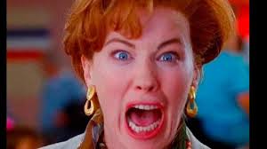 Who are the two people in the middle of the 90s photo?