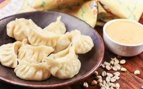 Vegetarian Momo Recipe Steamed Dumplings A Street Food From The North East India Recipe Street Food Recipes Food