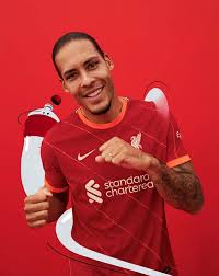 Made by nike and featuring bolted pinstripes and bright crimson sleeve cuffs and neckline to represent power, energy and danger, the reds will look undefeatable on the pitch next season. Nike Launch Liverpool 21 22 Home Shirt Soccerbible