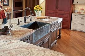 An ogee edge ties into the decorative details of the cabinetry. Typhoon Bordeaux Granite Natural Beauty In Your Kitchen