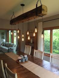 Reclaimed Barn Beam Light Fixture W Metal Brackets And Lights Etsy In 2020 Rustic Light Fixtures Barn Beam Lighting Farmhouse Dining Room Lighting