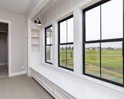 An interior window like this can make the airflow in the interior better. Accent Your Home With Marvin S Beautifully Dramatic Designer Black Painted Window Frames Windows And Doors House Windows Interior Windows