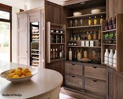Stick to the basics with one in white or acacia wood. 2 Storage In A Kitchen Tall Cabinets Seasonal Leaf Interior Design