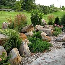 Not Only Are Artificial Rocks Much Lighter Than The Real Thing Its Not Easy To Rock Garden Landscaping Landscape Design Front Yard Rock Garden
