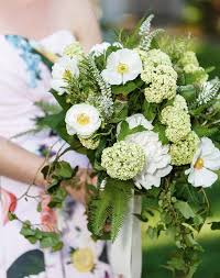 Simple wedding bouquets with wildflowers and roses. Wildflower Wedding Blooms Trend Purewow