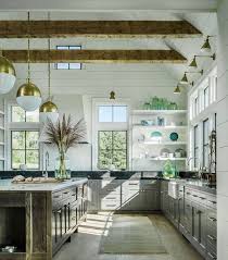 Too Fussy But The Idea Is Good With The Extra Large Island And Windows Instead O Farmhouse Kitchen Design Interior Design Kitchen Modern Farmhouse Kitchens