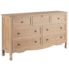 Next, think of the room's theme or color palette. Madeline Natural Stonewash 7 Drawer Dresser