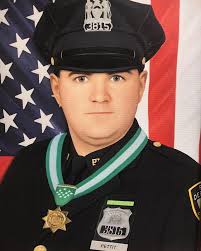P.O. Glenn Pettit Police Academy Video Production Unit EOW: 9/11/01 PO  Pettit hurried to the scene w/ his equipment in the hope that his camera  would catch the heroic rescue effots. He