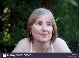 You don't need any external supplementation if you follow a the usual recommended intake of calcium for a woman aged 50 or younger and for men aged 70 or younger should take 1000 mg of calcium per day. Beautiful 50 Year Old Woman Doing Yoga On The Beach Stock Photo Alamy