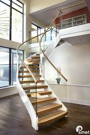 This Two Toned Helical Staircase With Open Treads And A Seamless Glass Balustrade Was A Complete R Staircase Contemporary Stair Railing Design Staircase Design