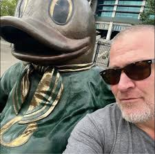 Football Player Commits to University Amidst Speculation