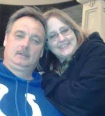 Which laminate floor would look best? The marble looking is what the wall  of the shower looks like. It's in a small bathroom. Walls are currently  white.