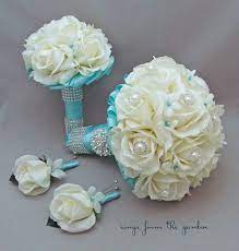 Tiffany blue wedding bouquets and bridal party flowers. Tiffany Blue Wedding Bouquets Bridal Bouquet Stephanotis Roses Tiffany Blue Ribbon Bridesmaid Blue Wedding Bouquet Tiffany Blue Wedding Bridal Bouquet