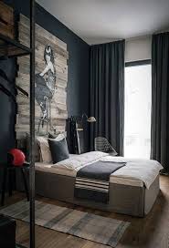 All black bedroom with an interesting art wall and very thoughtful lighting. 25 Masculine Bedroom Ideas That All Men Must Know Homemydesign