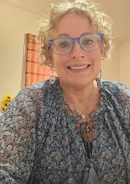 HAPPY THURSDAY YA'LL!!! Today is Christmas luncheon party day and Secret  Santa gift exchange here at work. But this gift that Daphne gave us a  little bit ago, got me teary-eyed. Isn't