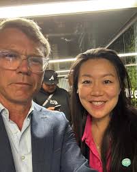 Lining up to board the plane to Wellington with National colleague Nancy Lu 