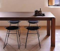 The darker surface and contrasting metal legs sure to turn a few heads. Modern Extendable Dining Tables Rouse Home