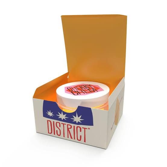 Détail de la consistance granuleuse du District Cannabis 1g Concentrate Sugar Hybrid Gelato Cake