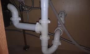 In some situations, you can't easily connect the sink's drain vent to the vent system, and you may have to run a length of vent pipe under the sink. Replumbing An Improper Trap Home Improvement Stack Exchange Blog