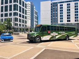 Do you have room for two more? Credit One Bank And Nascar Driver Kyle Larson Surprised Meeting Street Academy Students With Field Trip And Custom Designed Bus