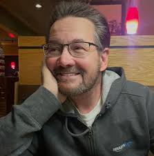 What should I do if my 22-year-old son threatens to leave the house and  live with his ex-husband unless I buy him a car?