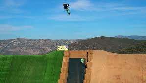Video: Trials-level motorcycle control meets Monster jumps on the Slayground  - RevZilla
