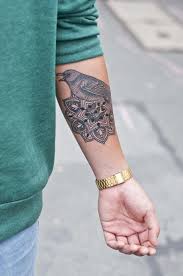 Forearm Bird Tattoos For Guys Amazing Tattoo Flower And Bird Tattoo Designs Men Forearm Tattoos Forearm Tattoo