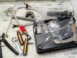 Then, unscrew the faucet handles and remove them to expose the faucet stem underneath. How To Replace A Bathroom Faucet How Tos Diy