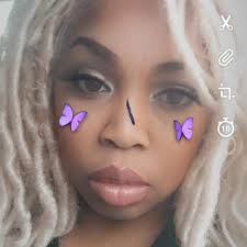 Can someone edit my wedding photo to make my husband's hair longer and put  his tongue back in his mouth?