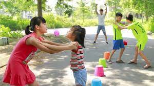 Working together and being socially open to each other goes a long way in developing the interpersonal skills that the kids will require later in their lives. Kids Play Team Games Move Ball By Mouth Team Building Activities For Kids W Children Song Youtube
