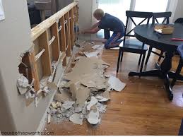 The two different textures on the kitchen side really don't work, so i would consider either laminating with drywall or skim the whole wall with joint compound here's an article on creating an entry. Tearing Out A Half Wall Between Kitchen And Family Rooms House Of Hepworths