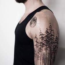 Pine Tree Forest Tattoo On The Left Upper Arm Forest Tattoos Tree Silhouette Tattoo Tattoos