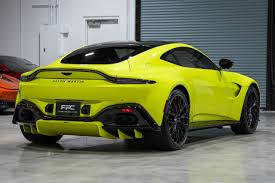 Image result for Satin Lime Essence 2023 Aston Martin