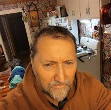 Best way to reward a young dog for treeing out of season without knocking  the coon out?