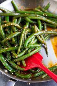 Spicy Sriracha Green Beans Recipe Peas And Crayons Recipe Bean Recipes Green Bean Recipes Green Beans