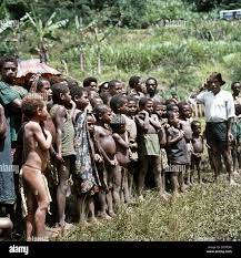 The undated picture shows naked school children with their teacher near  Mendi, Papua New Guinea. The population of Papua New Guinea, consisting  mainly of Papuas, is very diverse. The Papuas are hunters,