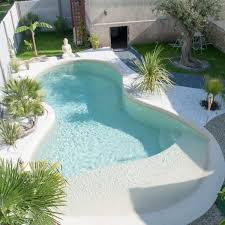 La Piscine Avec Une Plage Immergee En Beton Arme Monobloc Beach Entry Pool Small Swimming Pools Backyard Pool Landscaping