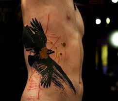 On the man's shoulder, a monochrome clock is shown, from this clock fly black birds, they are placed on the chest. Top 40 Best Rib Tattoos For Men