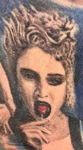 Topeka woman breaks tattoo world record