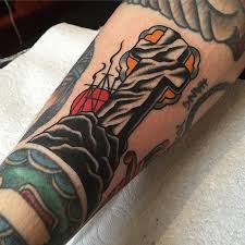 Until 2017, the rock had a small tattoo of a bull on his bicep. Traditional Rock Of Ages Tattoos Cloak And Dagger Tattoo London