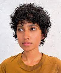 40 Newest Haircuts For Women And Hair Trends For 2021 Hair Adviser Short Curly Hair Curly Pixie Hairstyles Short Curly Haircuts