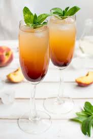 Fresh strawberry orange juice paired with bubbly champagne makes the best cocktail for brunch! Alcoholic Drinks Best Peachy Keen Mimosa Recipe Easy And Simple Cocktail How To Make Homemade Alcohol