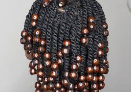 The final touch to this unusual hairdo would be the golden beads, which will make it extra shiny and attractive. 30 Low Maintenance Twist Hairstyles To Try