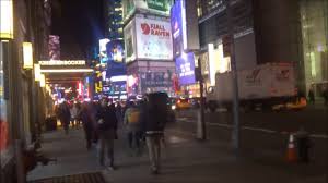 In the elevator, there is a tv. A Visit To The Hilton Garden Inn New York Times Square Central Youtube