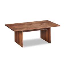 It's made from solid acacia wood and has a natural brown finish that shows off the wood's unique grain color variation. Hygge Coffee Table Chilton Furniture