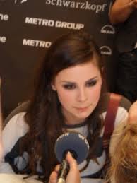 Lena presented with a gift and unique version of Satellite from South  African, Candy Benson